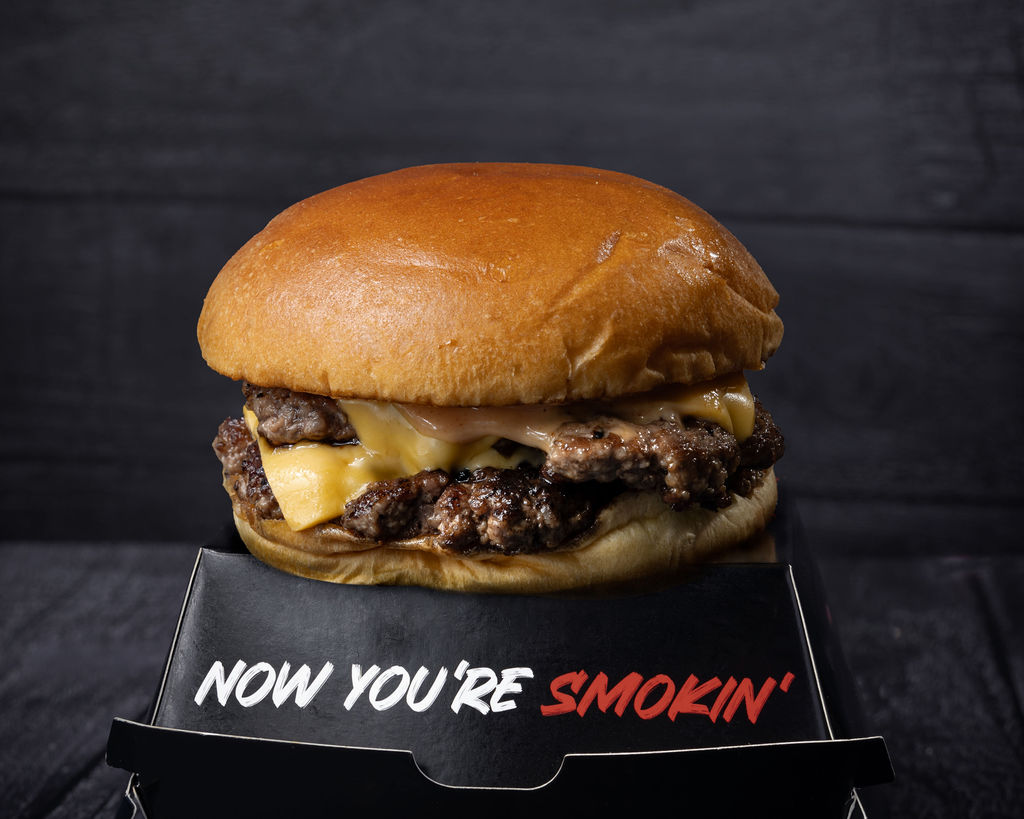 Smoked brisket burger with chips and slaw
